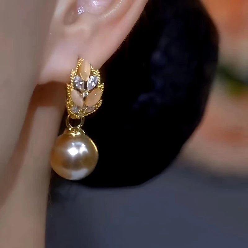 Close-up detail of the sparkling zircons and plating on the Wheat Ear Earrings