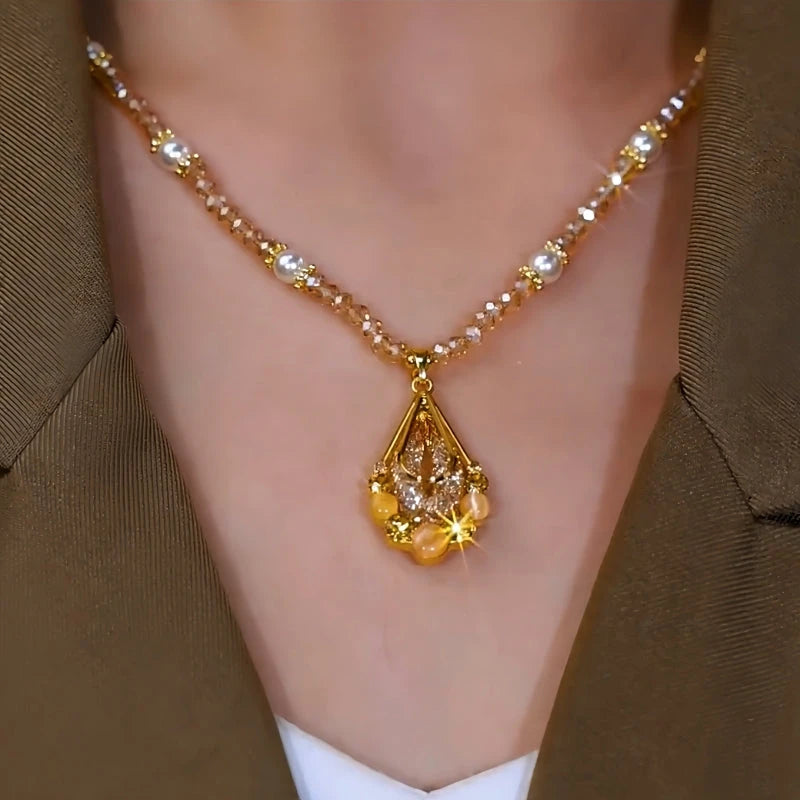 14K Gold-Plated Champagne Crystal Mesh Water Drop Necklace worn to showcase its length and pendant detail