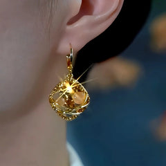 Close-up detail of the sparkling zircons and plating on the Champagne Zircon Earrings