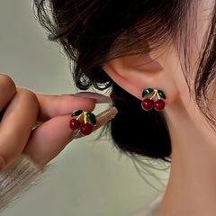 Close-up detail of the sparkling zircons and plating on the Red Cherry Earrings