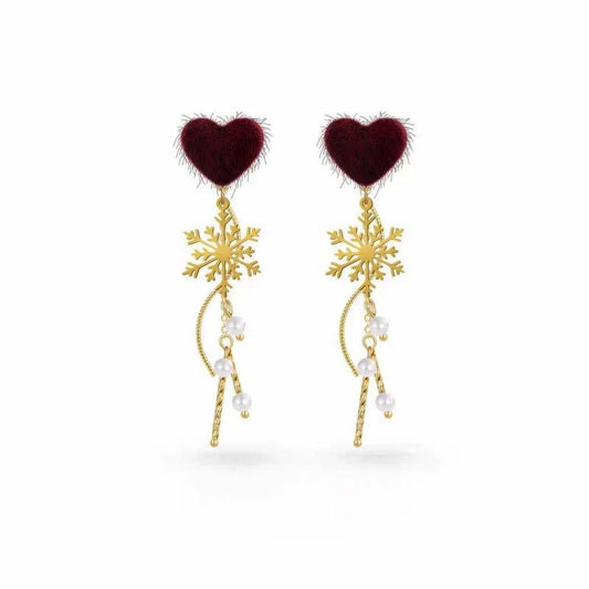 Model showcasing the dangle and style of the 14K Gold-Plated Christmas 2025 Heart Snowflake Earrings