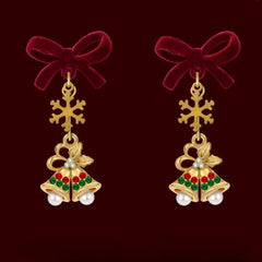 Close-up detail of the sparkling zircons and plating on the Christmas Bow Earrings