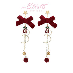 Angled view of the 14K Gold-Plated Christmas Bow Tassel Earrings
