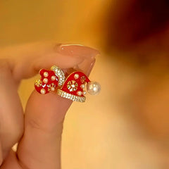 Close-up detail of the sparkling zircons and plating on the Asymmetrical Christmas Earrings