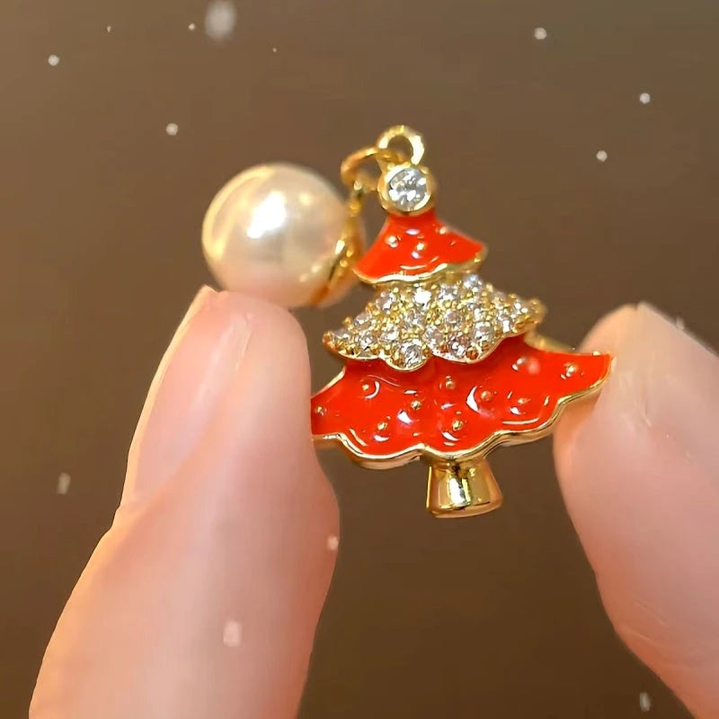 Angled view of the 14K Gold-Plated Christmas Diamond Zircon Artificial Pearl Christmas Tree Earrings