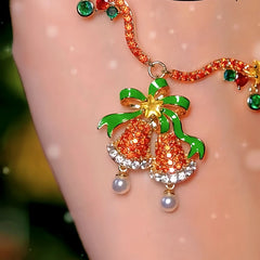 Detailed view of the 14K Gold-Plated Christmas Diamond Zircon Red Bell Necklaces chain and pendant