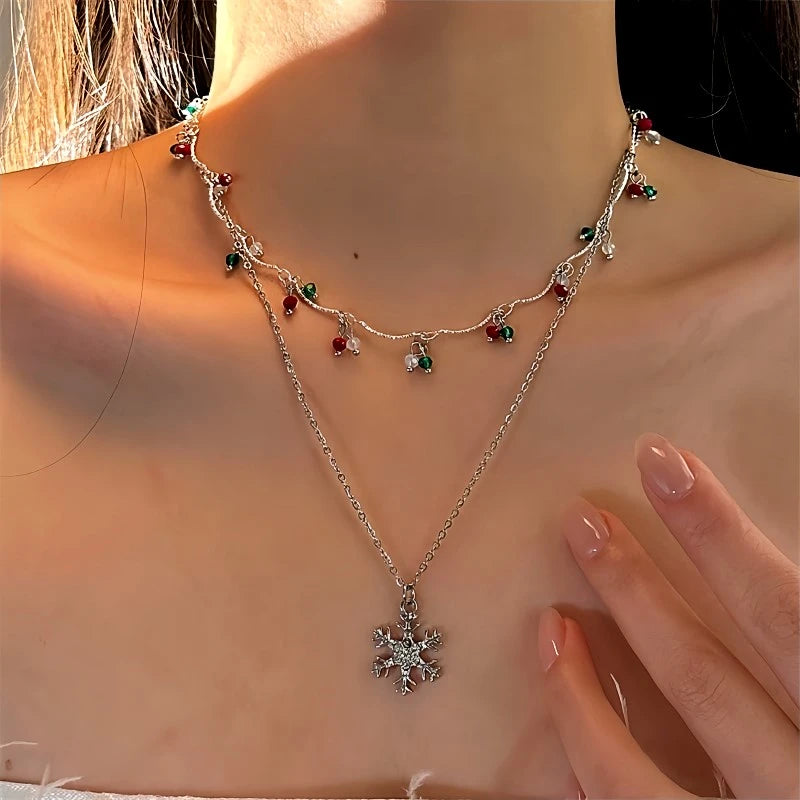 Close-up of the pendant and clasp on the Snowflake Tassel Necklace