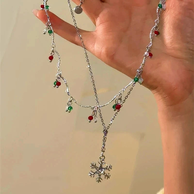 Detailed view of the 14K Gold-Plated Christmas Double-Layer Christmas Snowflake Tassel Necklace chain and pendant