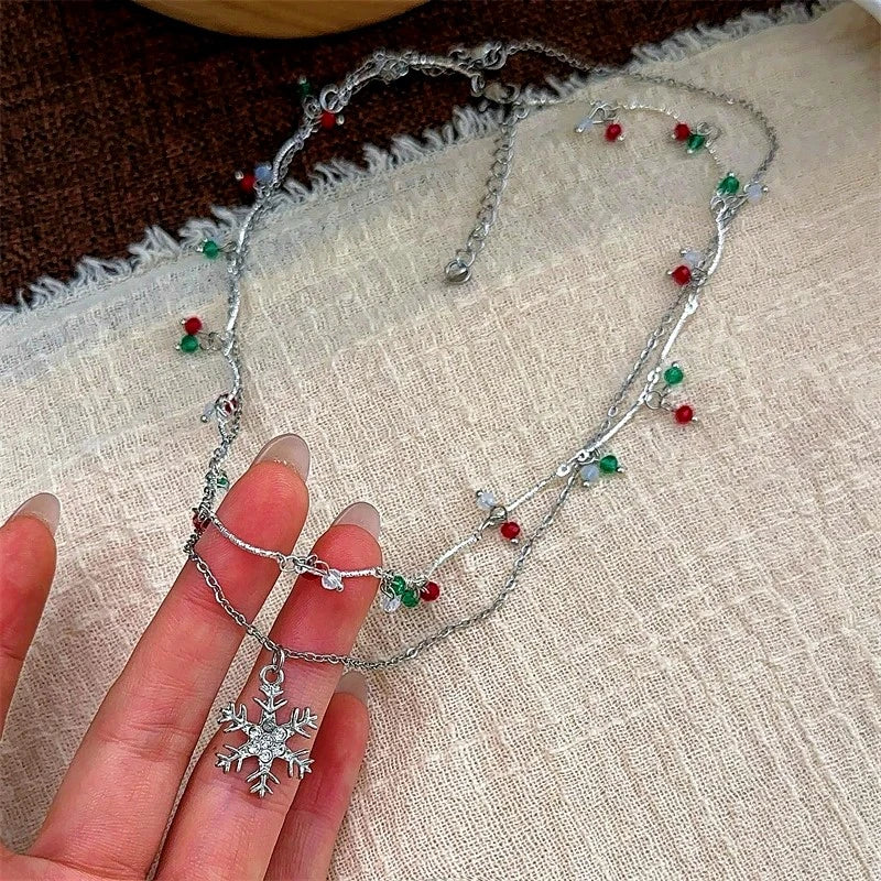 14K Gold-Plated Christmas Double-Layer Christmas Snowflake Tassel Necklace worn to showcase its length and pendant detail