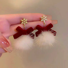 Close-up detail of the sparkling zircons and plating on the Fluffy Bow Earrings