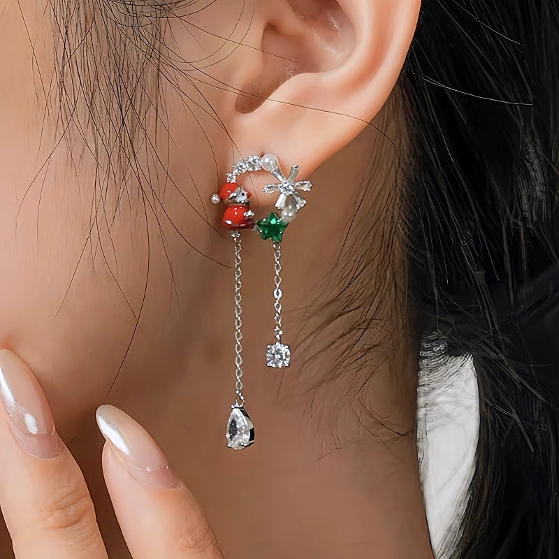 Angled view of the 14K Gold-Plated Christmas Santa Claus Snowflake Tassel Earrings