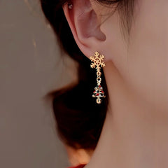 Close-up detail of the sparkling zircons and plating on the Snowflake Tree Earrings