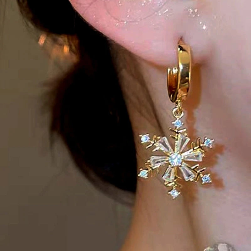 Close-up detail of the sparkling zircons and plating on the Golden Snowflake Earrings