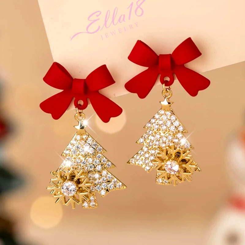 Angled view of the 14K Gold-Plated Christmas Tree Bow Earrings