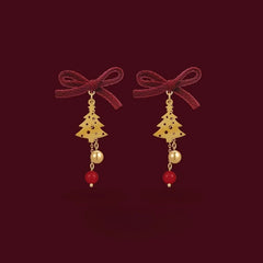 Close-up detail of the sparkling zircons and plating on the Christmas Tree Bow Earrings