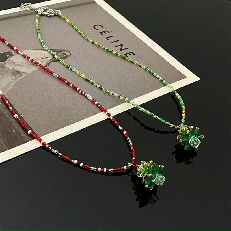 Close-up of the pendant and clasp on the Beaded Christmas Necklace