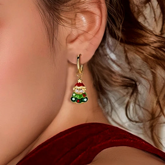 Model showcasing the dangle and style of the 14K Gold-Plated Christmas Tree Santa Claus Earrings