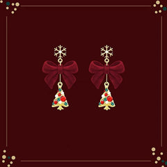 Close-up detail of the sparkling zircons and plating on the Christmas Tree Bow Earrings