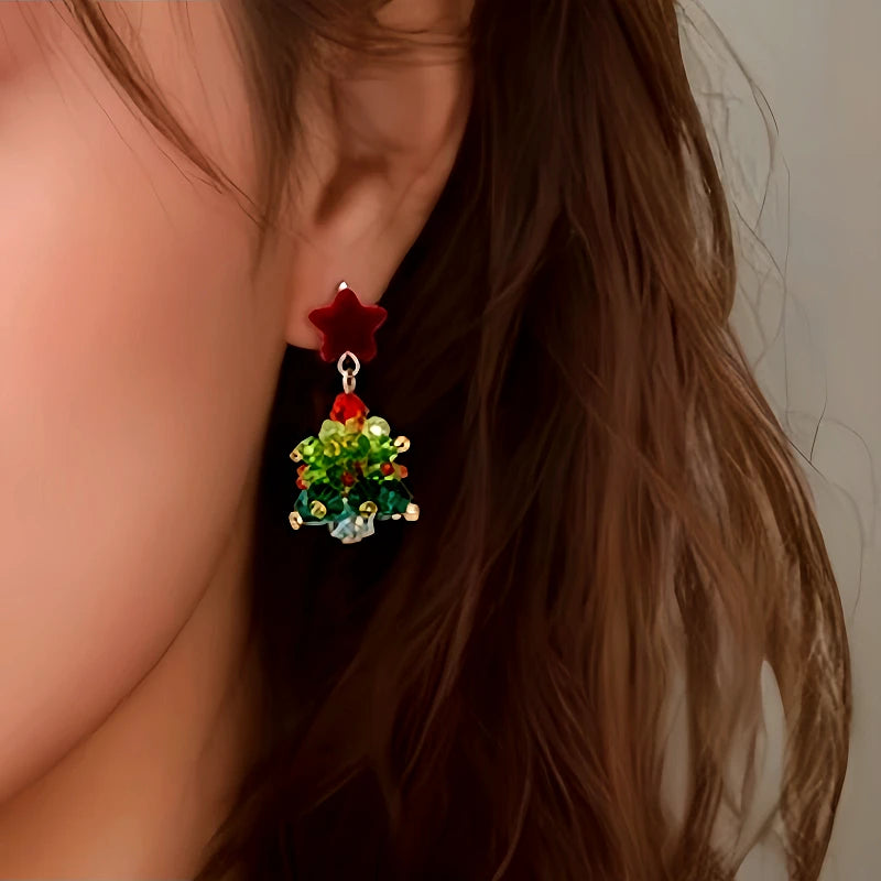 Close-up detail of the sparkling zircons and plating on the Christmas Tree Star Earrings