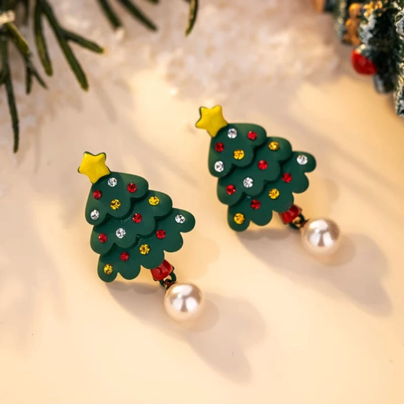 Angled view of the 14K Gold-Plated Christmas Tree Star Pearl Earrings