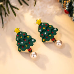 Angled view of the 14K Gold-Plated Christmas Tree Star Pearl Earrings