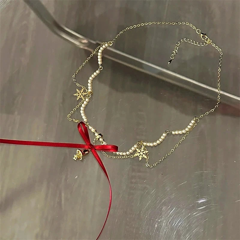 Close-up of the pendant and clasp on the Christmas Beaded Necklace