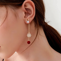 Close-up detail of the sparkling zircons and plating on the Deer Tassel Earrings