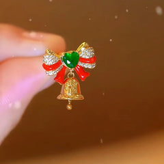 Model showcasing the dangle and style of the 14K Gold-Plated Christmas Zircon Diamond Bow Bell Earrings