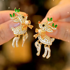 Model showcasing the dangle and style of the 14K Gold-Plated Christmas Zircon Diamond Little Elk Artificial Pearl Earrings