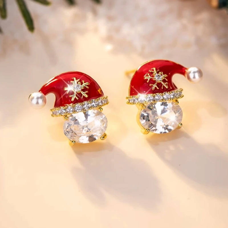 Angled view of the 14K Gold-Plated Christmas Zircon Hat Earrings