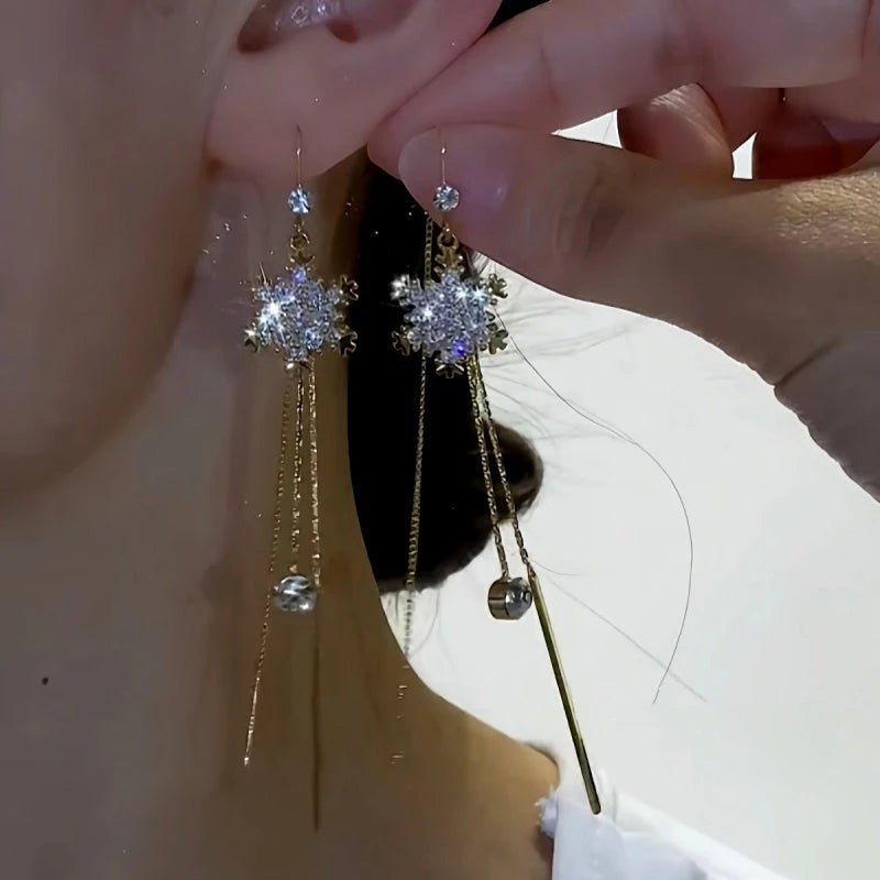 Close-up detail of the sparkling zircons and plating on the Snowflake Threader Earrings