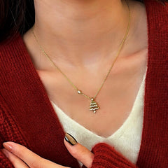 Detailed view of the 14K Gold-Plated Christmas Zircon Tree Earrings chain and pendant