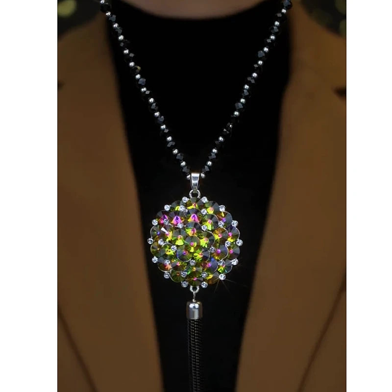 Close-up of the pendant and clasp on the Crystal Sweater Necklace