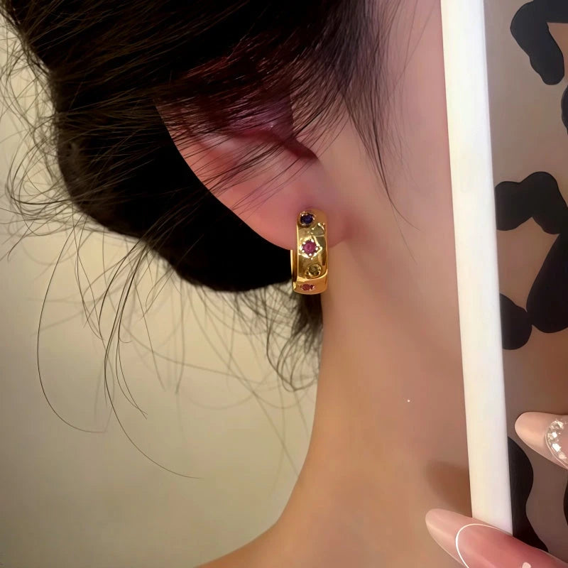 Close-up detail of the sparkling zircons and plating on the Colorful Zircon Hoops