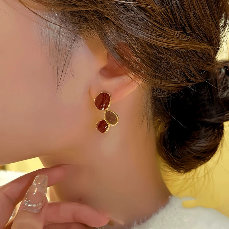 Angled view of the 14K Gold-Plated Contrasting Irregular Diamond Earrings