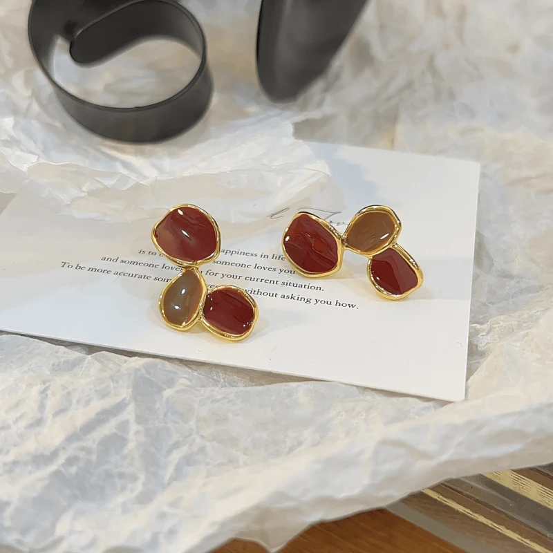 Close-up detail of the sparkling zircons and plating on the Irregular Diamond Earrings