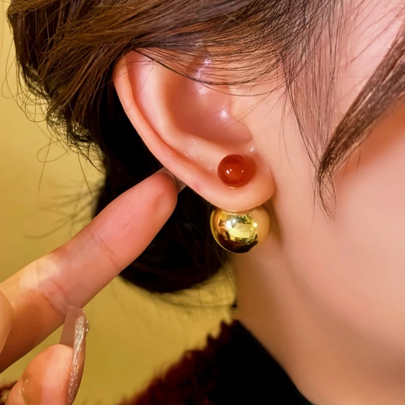 Close-up detail of the sparkling zircons and plating on the Contrasting Beads Earrings