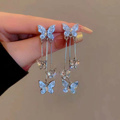 Angled view of the 14K Gold-Plated Crystal Butterfly Earrings