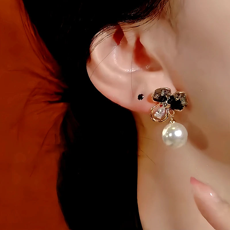 Close-up detail of the sparkling zircons and plating on the Crystal Flower Pearl Earrings