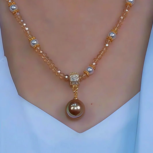 14K Gold-Plated Crystal Pearl Necklace worn to showcase its length and pendant detail