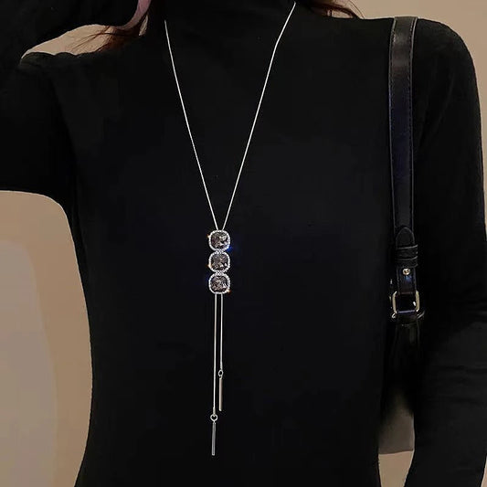 14K Gold-Plated Crystal Sweater Chain Necklaces worn to showcase its length and pendant detail