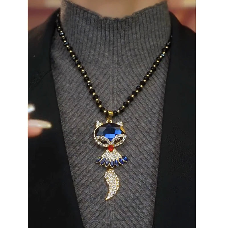 Close-up of the pendant and clasp on the Smart Fox Necklace