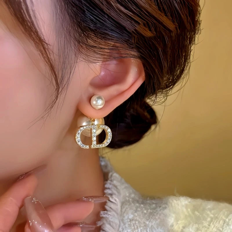 Close-up detail of the sparkling zircons and plating on the Bead Jacket Earrings