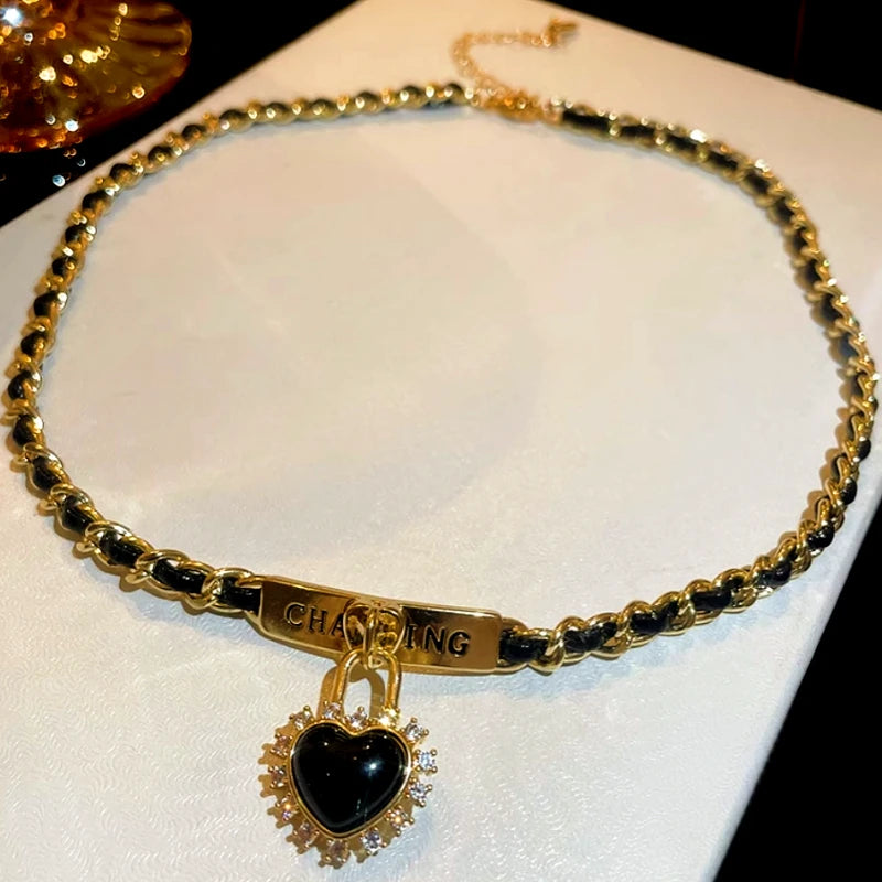 Close-up of the pendant and clasp on the Love Lock Necklace