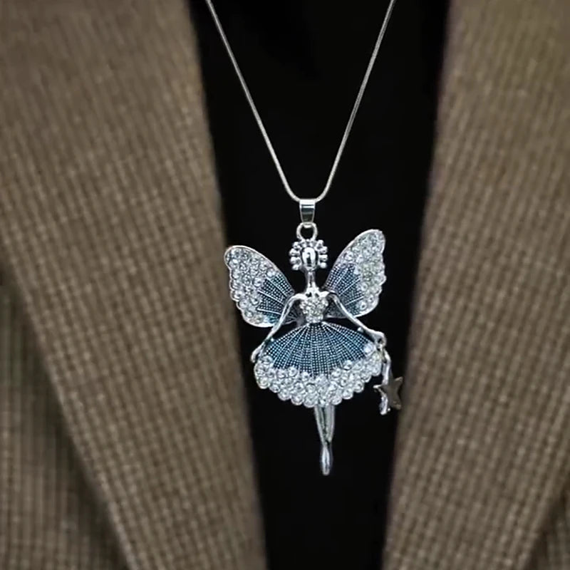 Close-up of the pendant and clasp on the Angel Sweater Necklace