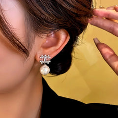 Close-up detail of the sparkling zircons and plating on the Diamond Bead Earrings