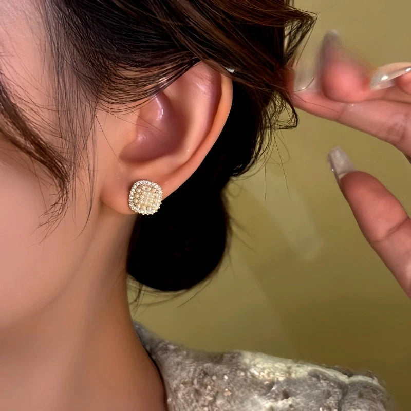 Close-up detail of the sparkling zircons and plating on the Diamond Beads Studs