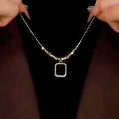 14K Gold-Plated Diamond Black Square Necklace worn to showcase its length and pendant detail
