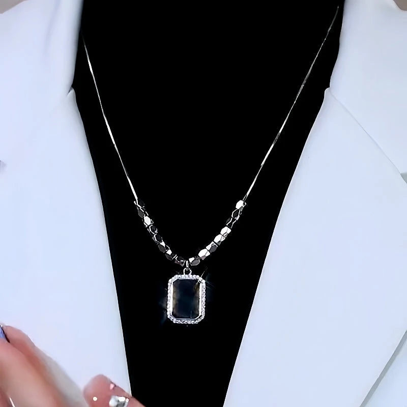 The perfect Black Square Necklace for layering or wearing as a statement piece