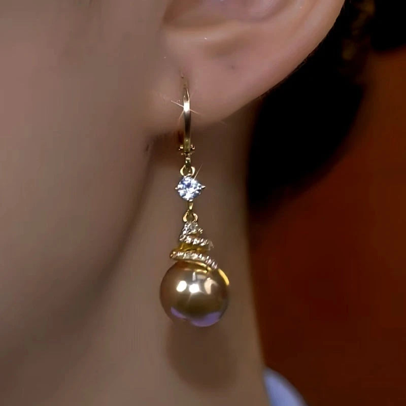 Close-up detail of the sparkling zircons and plating on the Brown Pearl Earrings